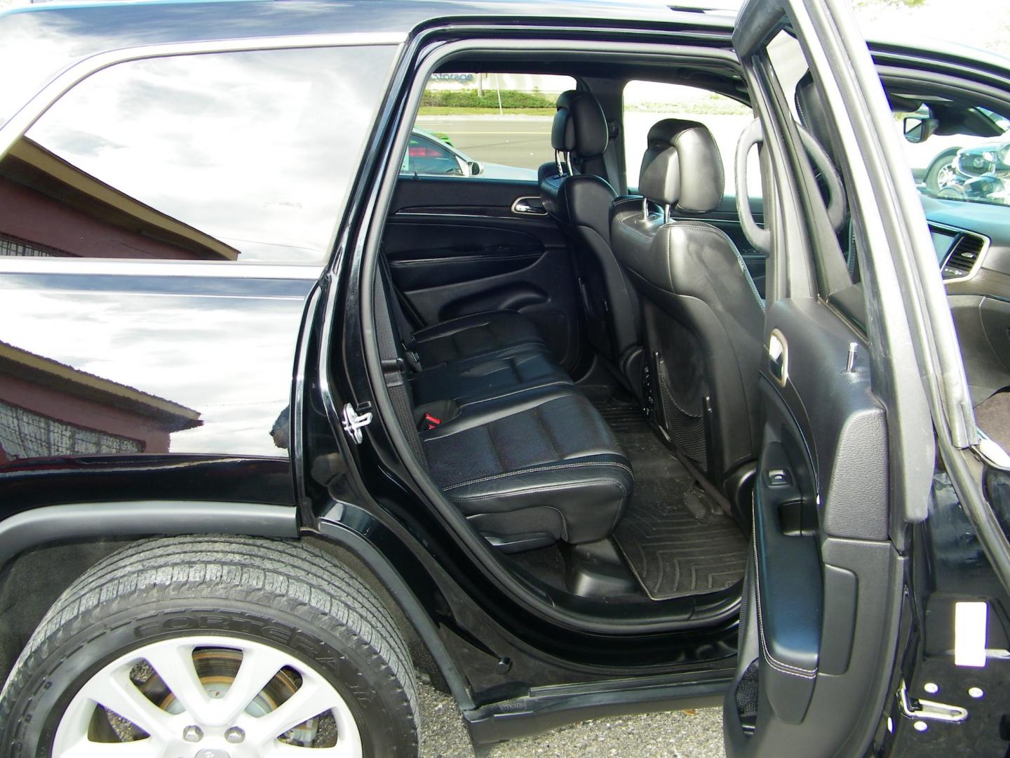 2017 Black /Black Jeep Grand Cherokee Limited (1C4RJEBG4HC) with an 3.6L V6 engine, Automatic transmission, located at 4000 Bee Ridge Road, Sarasota, FL, 34233, (941) 926-0300, 27.298664, -82.489151 - Photo#11